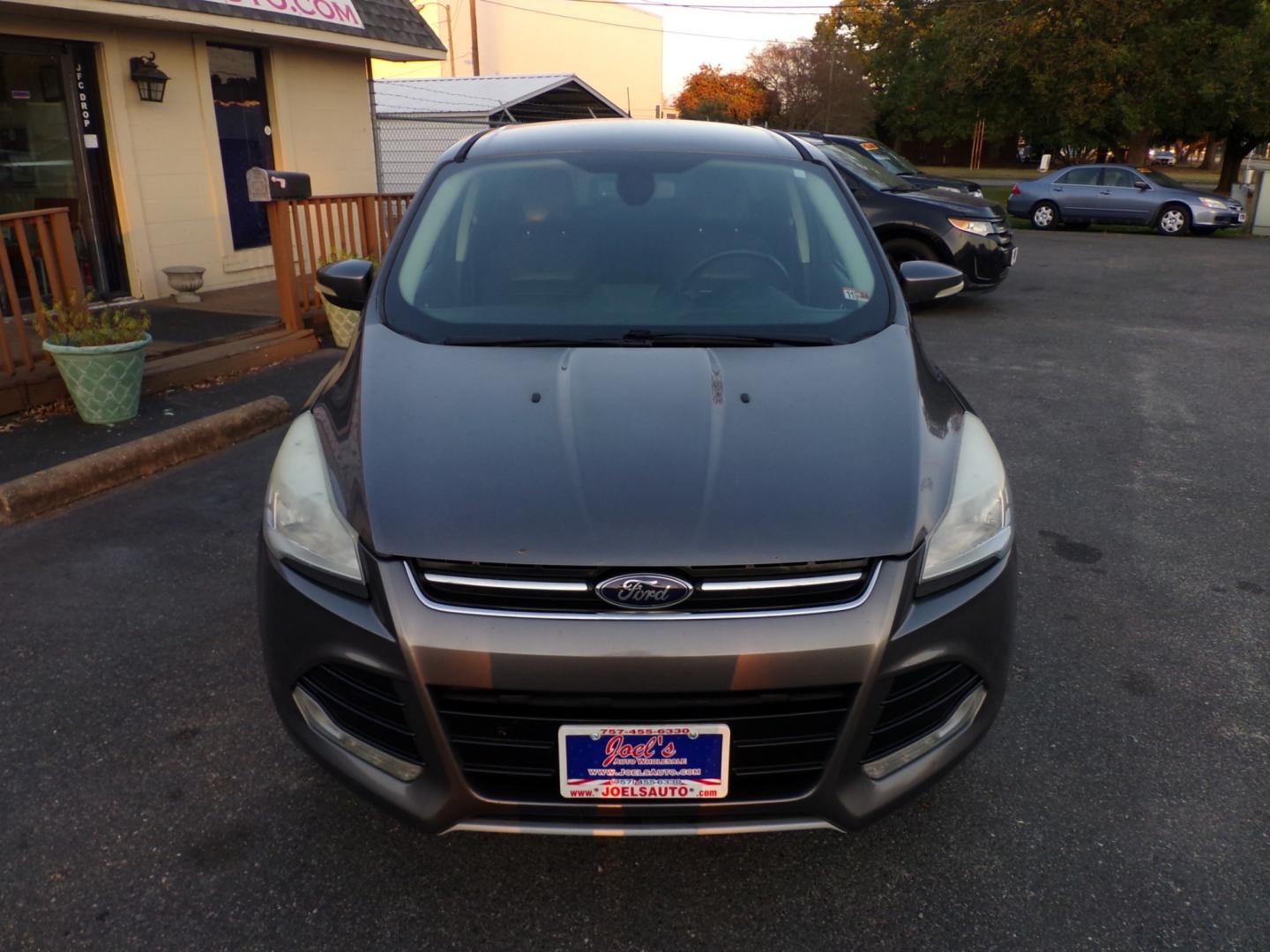 2013 Grey Ford Escape SEL FWD (1FMCU0H96DU) with an 2.0L L4 DOHC 16V engine, 6-Speed Automatic transmission, located at 5700 Curlew Drive, Norfolk, VA, 23502, (757) 455-6330, 36.841885, -76.209412 - Photo#3